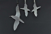Sooty Shearwater (Muttonbird or Titi) silver pendant and brooch