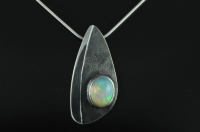 Asymmetric reticulated blackened Sterling silver and Welo Ethiopian opal pendant