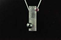 South Pacific Black pearl, Ruby and reticulated Sterling silver pendant