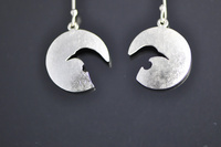 Tui Head Profile Silver Earrings