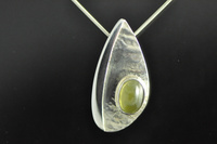 Green Cabochon Sapphire and Asymmetrical Silver Pendant