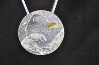Albatross at sea with 22ct gold sunrise silver pendant