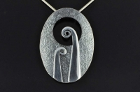 Double Koru silver pendant