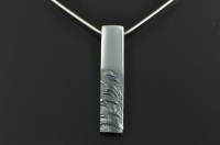 Narrow textured silver pendant