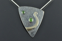 Asymmetric textured blackened silver pendant with bronze Koru and Pounamu