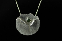 Hollow form Sterling silver and Pounamu pendant