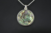 Paua shell and silver circular pendant