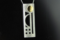 C.R.Mackintosh style 22ct gold and bright silver pendant