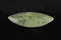 Pounamu and silver brooch