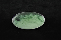  Pounamu and silver brooch