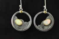 Opal, 22ct gold and blackened silver earrings
