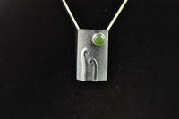 Pounamu and double Koru silver pendant