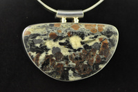 Biotite and garnet schist silver pendant 