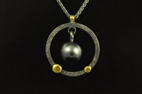 Black pearl, 22ct gold and silver pendant